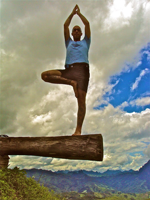 Nate in the Tree pose near Vang Vieng.