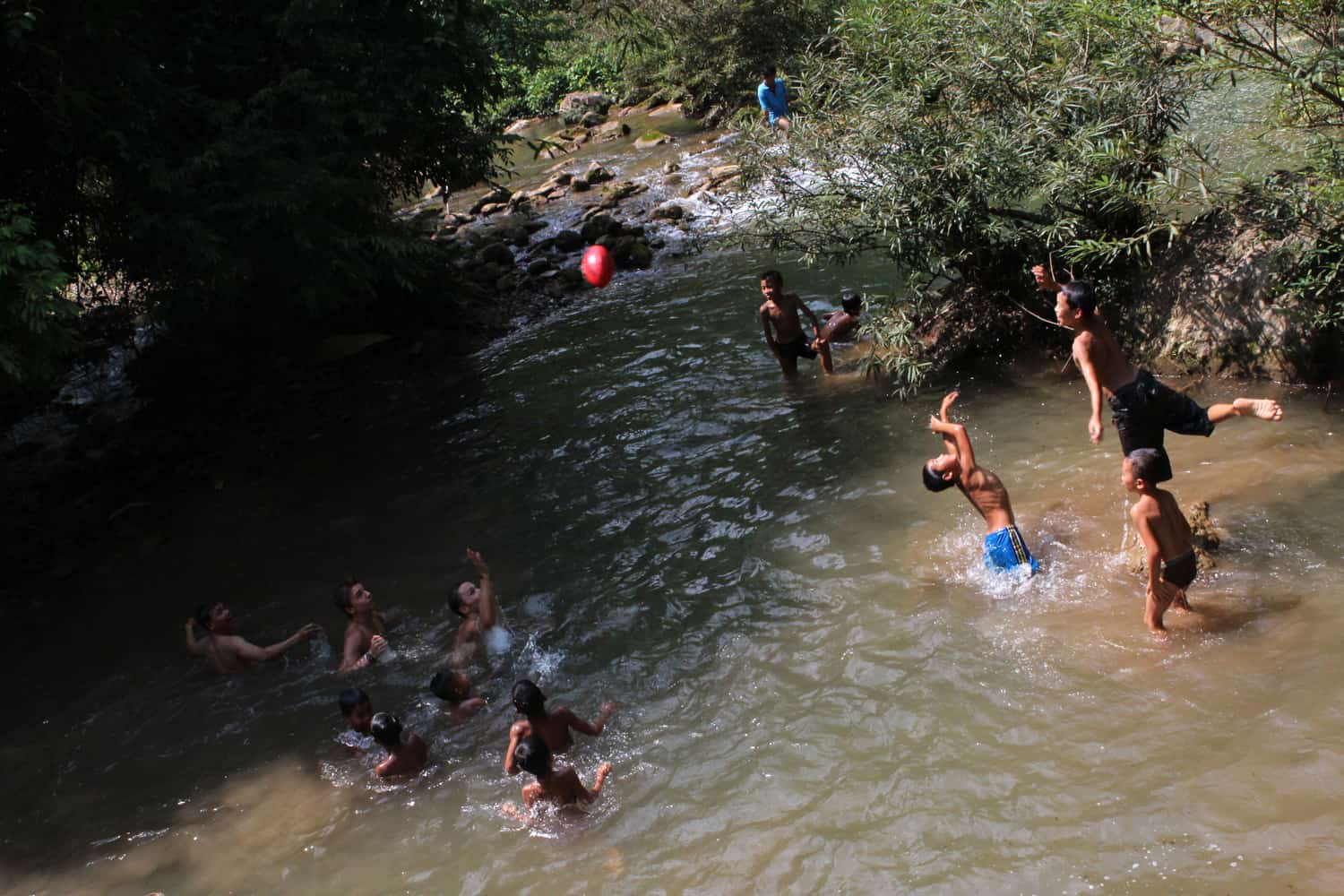 Playing in the river during our homestay in Laos