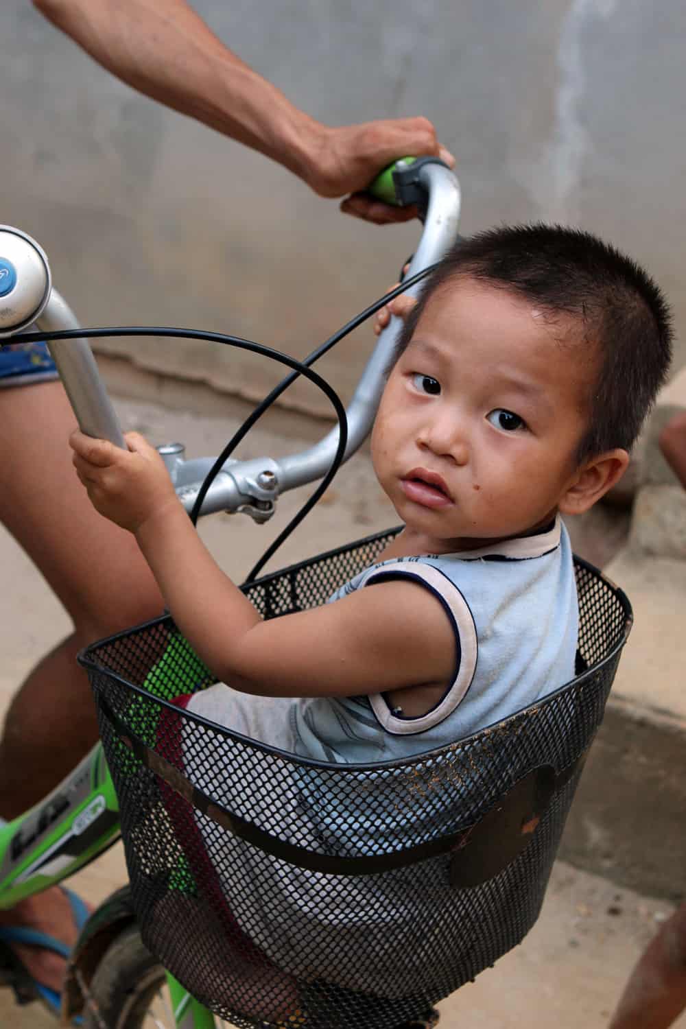 Boy in a basket, Laos
