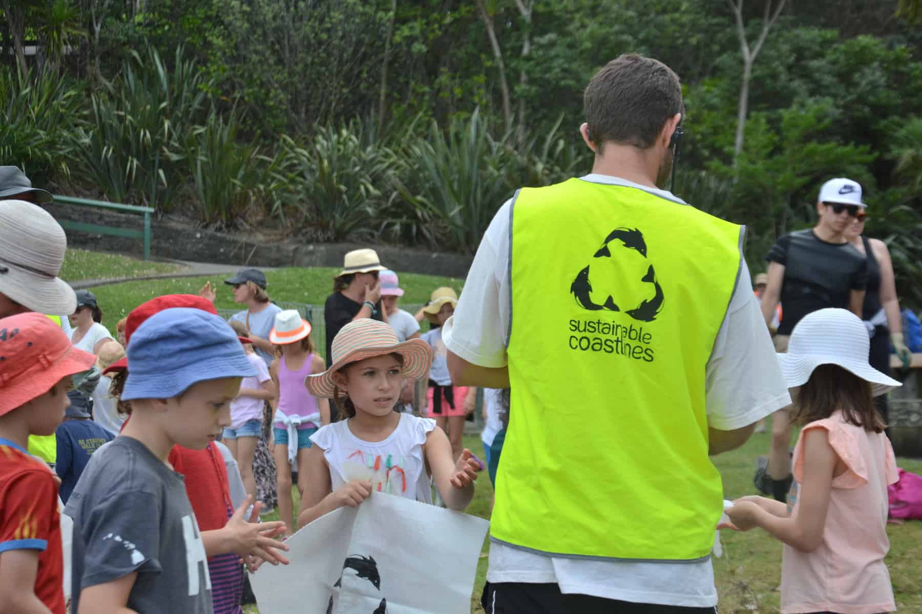 School children helping with clean up