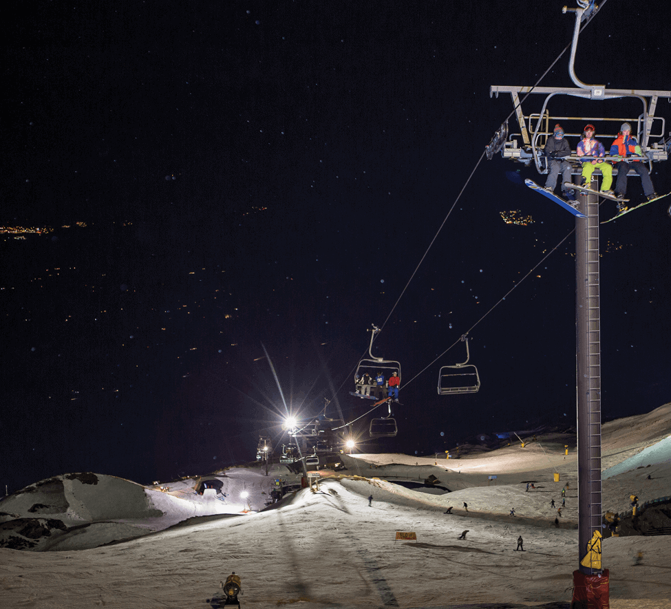 Skiers at night