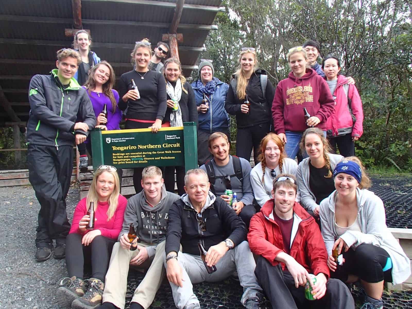 Group celebrating finishing the Tongariro Crossing