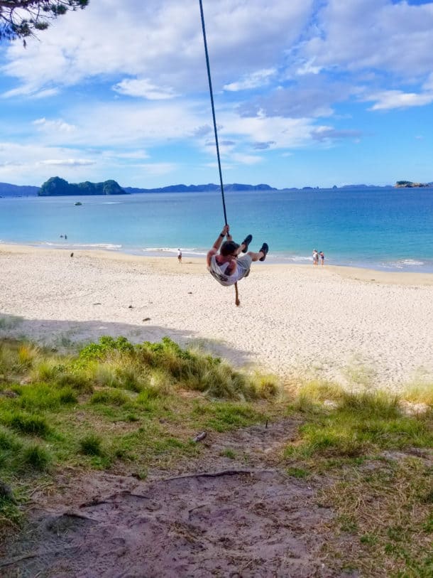 A rope swing on a beach at Hahei