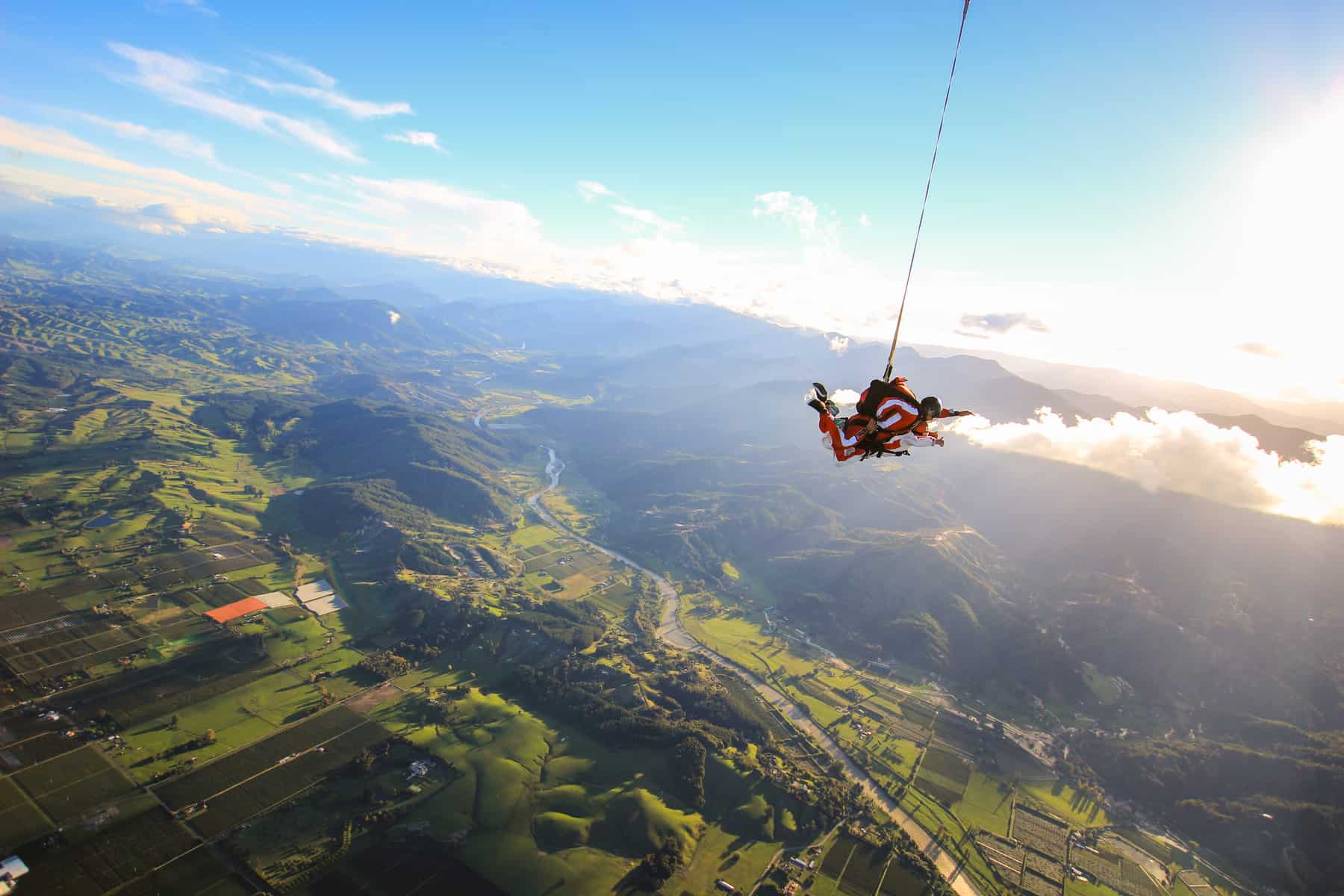 Sky diving above the mountains